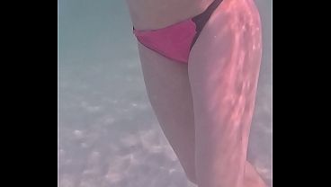 Amateur long legs perfect body girl’s relaxing underwater swimming